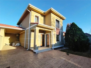 Duplex despartit prin garaj - zona excelenta - toate utilitatile - asfalt - panouri solare