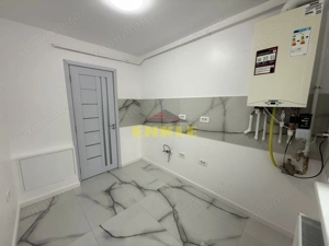 De vanzare apartament cu 2 camere, etaj2, RENOVAT IN TOATALITATE - imagine 2