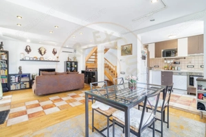 Casa luminoasa cu gradina si garaj 