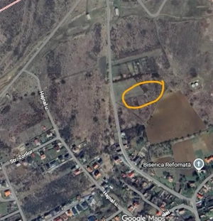 Vand  schimb cu casa la tara- teren Livezeni, pe deal cu panorama, Jud Mures