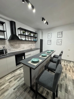  Casă elegantă de închiriat în Giroc   3 camere, curte și terasă acoperită - imagine 3