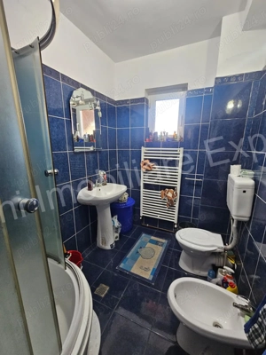  Casă + spațiu comercial de vânzare în Curtea de Argeș. - imagine 16