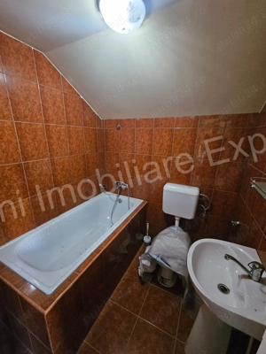  Casă + spațiu comercial de vânzare în Curtea de Argeș. - imagine 17