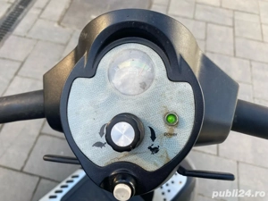 de vanzare carucior electric pentru oamenii cu dezabilitati 