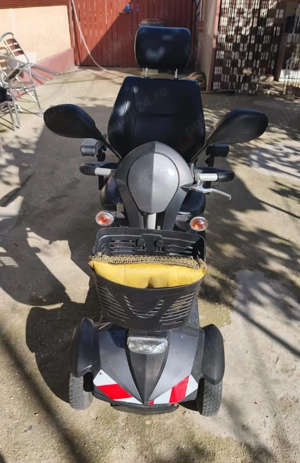 Căruț electric persoane cu dizabilități 