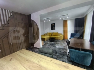 Apartament cu 3 camere și living  ultrafinisat în suprafață de 100 mp