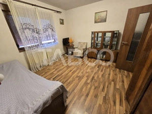 Casa individuala de vanzare 4 camere garaj curte 1310 mp Gusterita