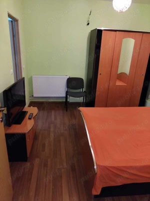 Închiriez locuita  formata din 2 camere situata la parteru unui bloc. - imagine 6