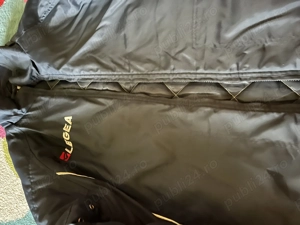 Vând geacă lungă groasă de antrenor Legea