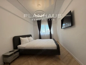 Inchiriere-ultramodern apartament zona rezidentiala ,3 camere,etaj 1,loc de parcare  - imagine 11