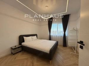 Inchiriere-ultramodern apartament zona rezidentiala ,3 camere,etaj 1,loc de parcare  - imagine 4