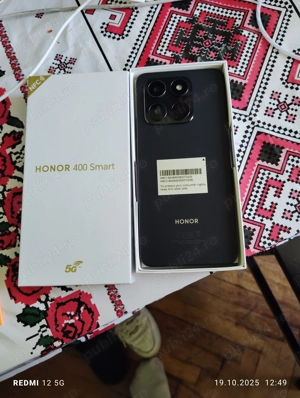 Smartphone nou în cutie - imagine 2