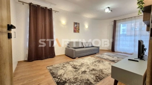 Apartament 2 camere cu parcare si curte proprie