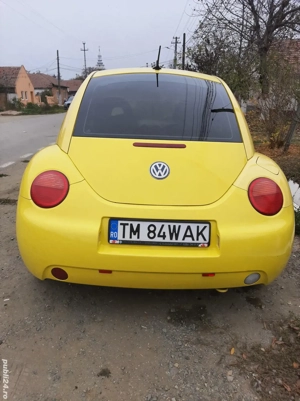 Wolkswagen New Beetle 2002 E4 1.4 benzină - imagine 4