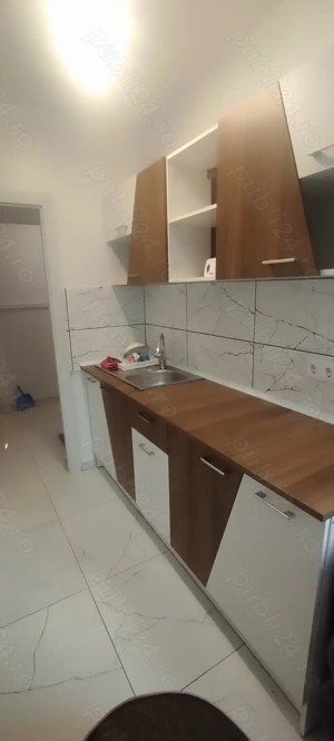 Închiriez apartament două camere  - imagine 2