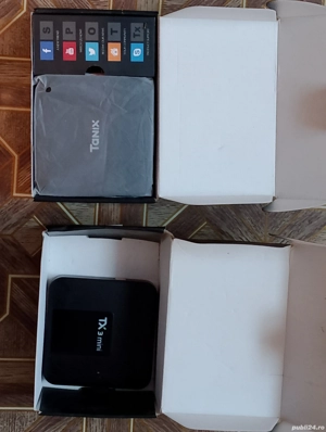 Vând 2 bucăți tv box android Tanix + tastatură cu touchpad