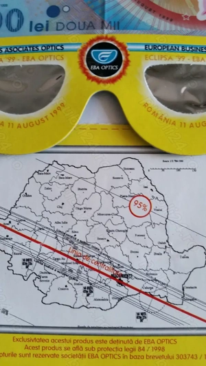 Bancnotă și moneda cu eclipsa de soare