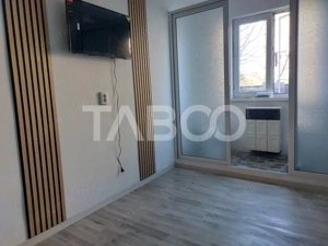 Garsoniera 11 mp renovata total in 2025 etaj 1 baie proprie Cisnadie - imagine 3