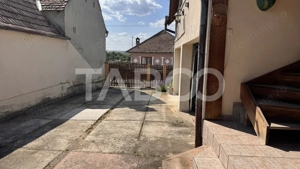 Casa de vanzare 6 camere loc de relaxare garaj teren 669 mp Cornatel - imagine 10