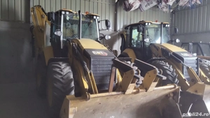 Vand 2 bucati Buldoexcavator Caterpillar 434