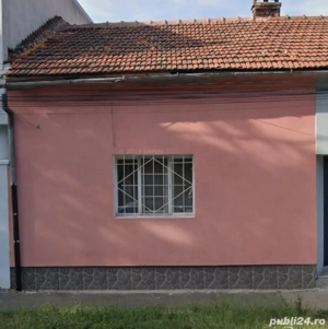 Casa la curte comuna