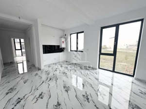 Apartament cu 2 camere si gradina de 50 mp la intrare in Giroc.