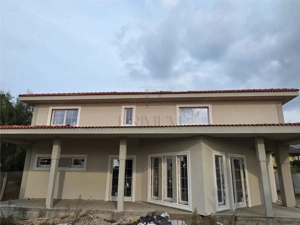 Casa individuala - teren 730 mp - garaj - 5 dormitoare - living 57 mp