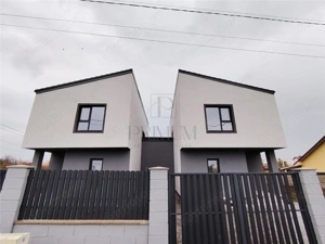 Duplex modern - despartit prin baie - 2 fronturi stradale - pompa caldura