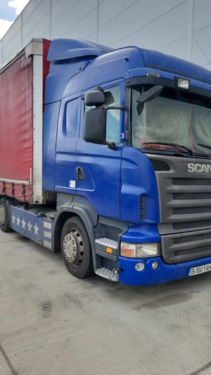 Scania mega R420 cu semiremorca Schmitz 