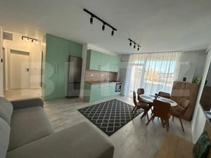 Închiriez apartament 3 camere, finisat și utilat, în zona centrală - imagine 2