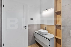  Casă finalizată sub îndrumarea unui designer – rafinament și confort - imagine 10