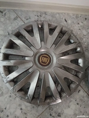 1 capac roată original FIAT. 