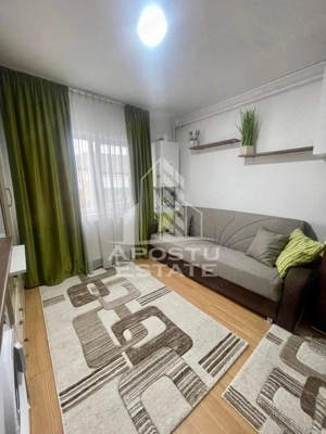 Garsoniera in bloc de apartamente,centrala proprie,zona Aradului
