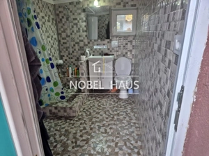 Casa si teren, central Barlad, str Al Sahia - imagine 9