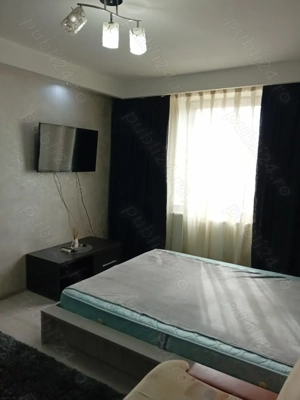 Închiriez garsoniera decomandata 