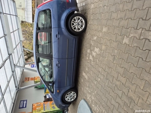 Vand autoturism Ford C Max an fabricatie2006 km267000 cauciucuri iarna vara cu  genti pret 1800 euro - imagine 3