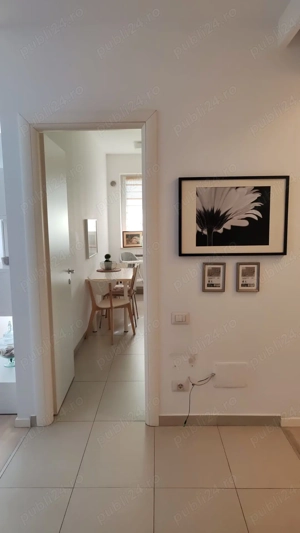 Închiriez apartament 2 camere, mobilat, utilat, inclusiv garaj. Blvd Apicultorilor, S 1. 