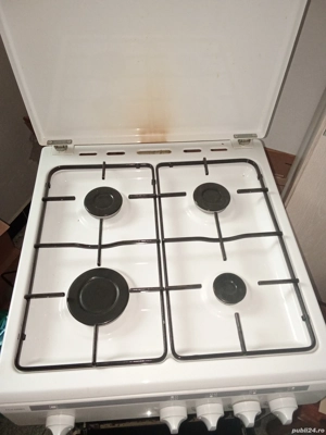 Vând aragaz . pe gaz 