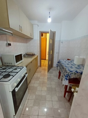 Inchiriez apartament cu 2 camere mobilat in micro 17 etajul 1. - imagine 5