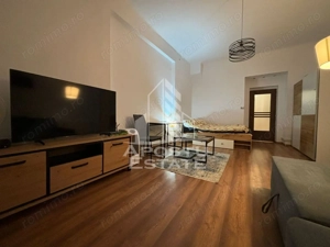 Apartament cu o camera,etajul 1, centrala proprie, zona Centrala