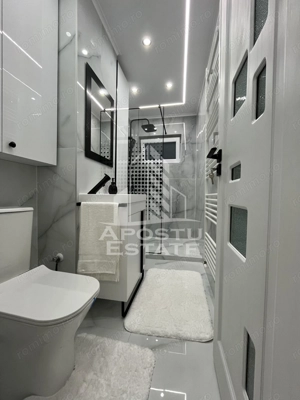 Apartament cu 3 camere, etajul 2, centrala proprie, renovat,Dambovita - imagine 12