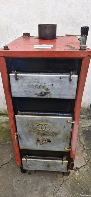 vând centrală pe lemne 