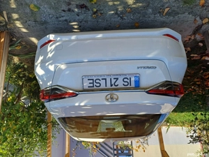 Vand atoturism Toyota Corolla an 2  cp cu 15000 km rulati .ca si noua 000