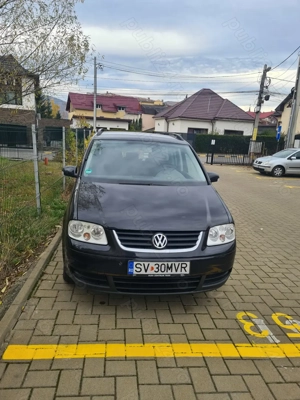 Volkswagen Touran 7 locuri