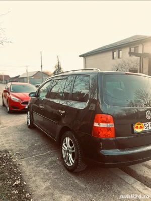   Touran 7 locuri, cutie automată   2.0 TDI, 140 CP   2006