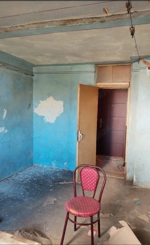 Vând in rate  garsoniera !