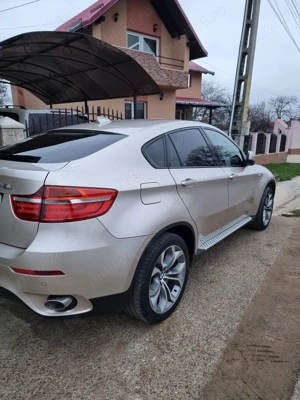 BMW X6M. 306 CP 2013
