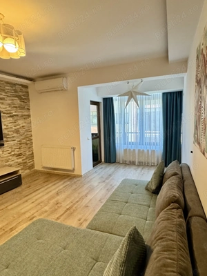 Închiriez apartament spațios și modern în zona Grand Arena 
