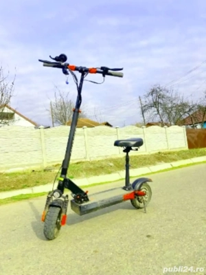 Kukirin m4 pro ,motor 500w ,baterie 48v 18a,viteza maxima 50 km h roti gonflabile 10x3,autonomie 40 