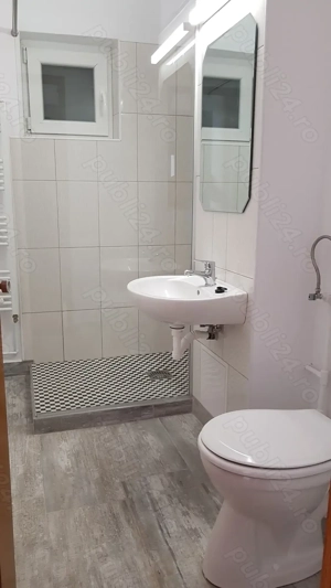 Rovine, zona garii, apartament doua camere, modificat in trei, etaj 2 din 4, centrala proprie. - imagine 11